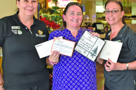 Monique Foxwell (centre) with Mareeba Leagues Club’s Lucy Connor (left) and Di Campbell (right).