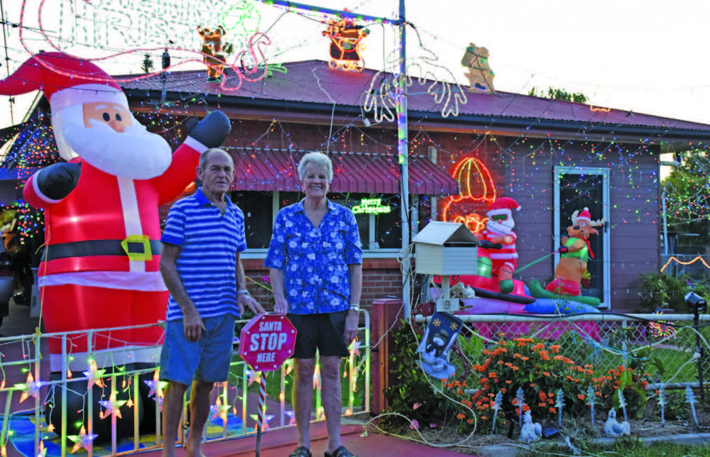 Irene and Bill at the front of their winning house on Totten Street, Mareeba.
