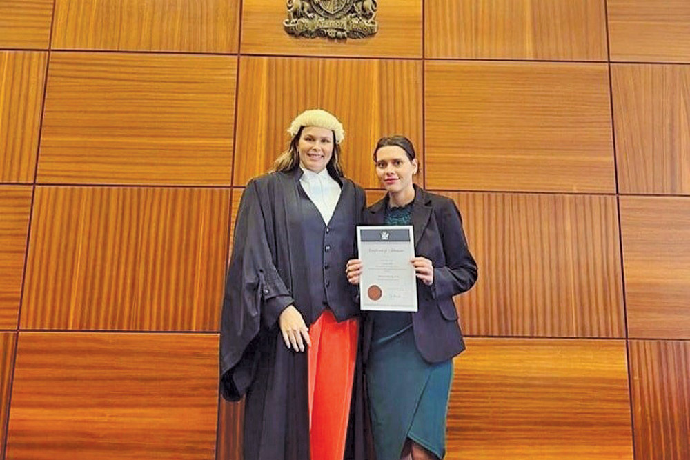 Lawyer Shaquille Chong (right) with Barrister Melia Benn, a friend who moved her admission as a lawyer.