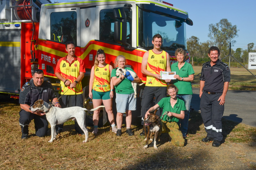 The QFES Blazers wheelbarrow race team donation $3000 to the Mareeba Animal Refuge.
