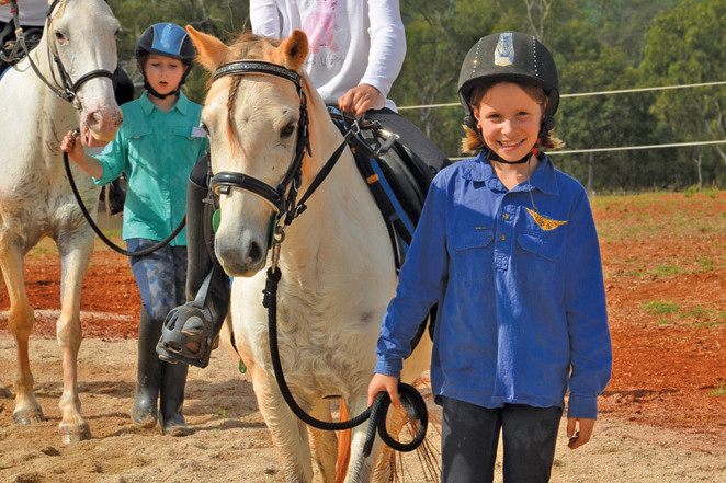 Pictured above is Chelsea (riding Caiden) and Charlie (leading) at the holiday camp.