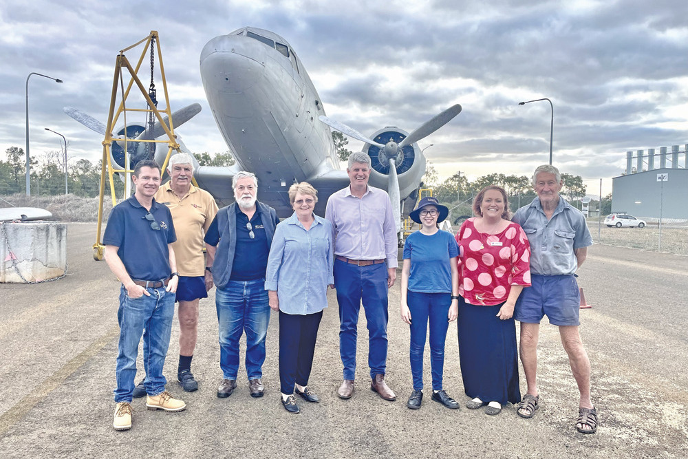 Pictured in front of C-47 Dakota aircraft (from left) are FNQAM president Brendan Kent, volunteers John Hardy, Andy Smith and Joan Stanton, Tourism Minister Stirling Hinchcliffe, student volunteer Teresa, Mareeba Shire’s Local Tourism Organisation chair Cr Lenore Wyatt, and volunteer Charlie Jennings. RIGHT: President Brendan Kent and in the Tourism Minister Stirling Hinchcliffe inside the restored C-47 Dakota aircraft.