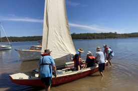 Members of Sailability Cairns inspect their new sailing vessel, Om Toch, donated by the Wooden Boat Association of Cairns. (PHOTO: Sheila Sparks)