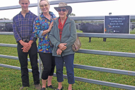 Lee-Ann Pitcher (middle) from Roharn Pastoral in Port Douglas with mother Margaret and nephew Arthur. Lee-Ann was very pleased with her purchase of Lot 31, a bull which is pictured in the background.