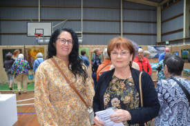 Raelene Wallace (left) with artist Lorraine Cross who took out the Oil Award category with her artwork “Softly Softly”.