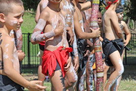 Aboriginal dancers prepare to perform to their peers at NAIDOC Day.