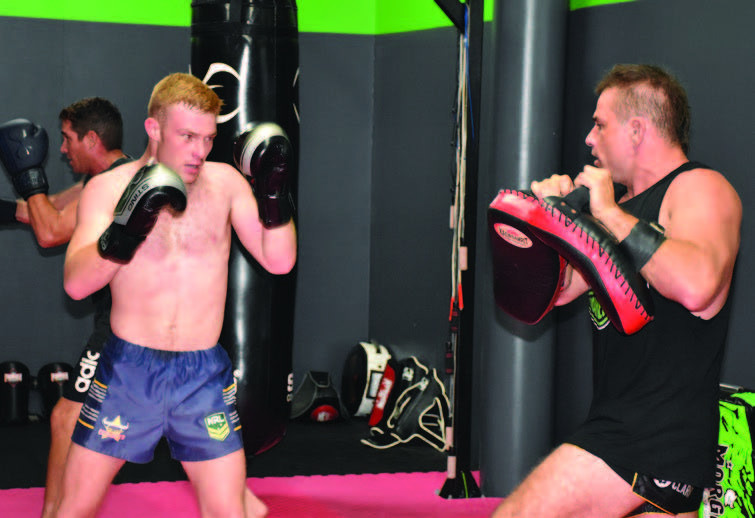 Black Dog Muay Thai fighter Michael Quintieri running drills with head trainer and owner Daniel Grant.