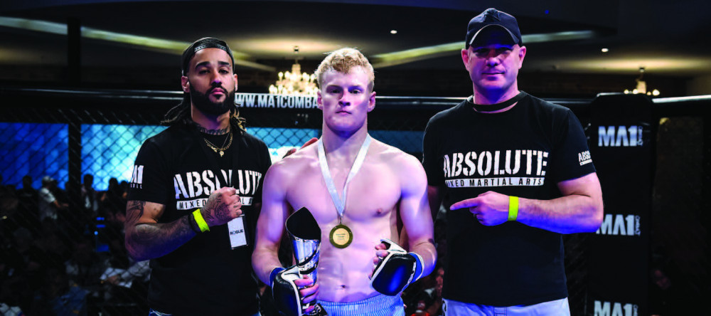 Liam Eastgate with Raja Shippen and Simon Carson after Liam’s first MMA fight and subsequent win last Sunday night. PHOTO CREDIT: William Luu.