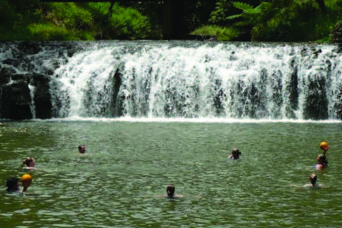 Water Polo players, playing at the Malanda Falls back in 2006.