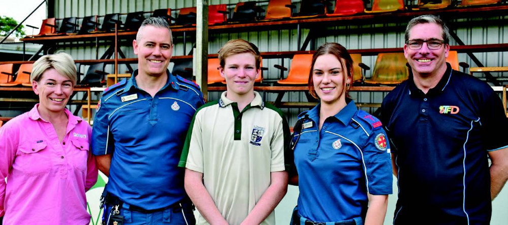 Jacob (centre) with paramedics Nathan Ross, Lauren Turnbull and parents Candy MacLaughlin and Paul Fagg.