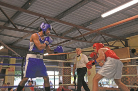 Mareeba’s Ashton Cater had a tough match against Redlynch Boxing’s Daniel Burns.