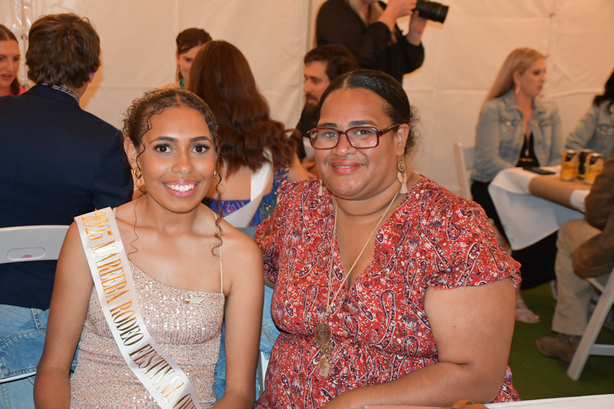 Edwardine Gela (right) from Ngoonbi Community Services and Queen entrant Sasha Grogan.