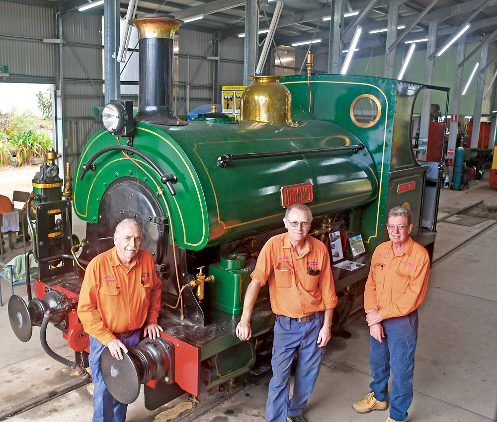 Pictured are Atherton-Herberton Historic Railway president Bob Slater, machinist Mark Pierson and welder and boilermaker Steve Delacy with the 1905 Peckett locomotive which has taken more than 90,000 hours to restore.