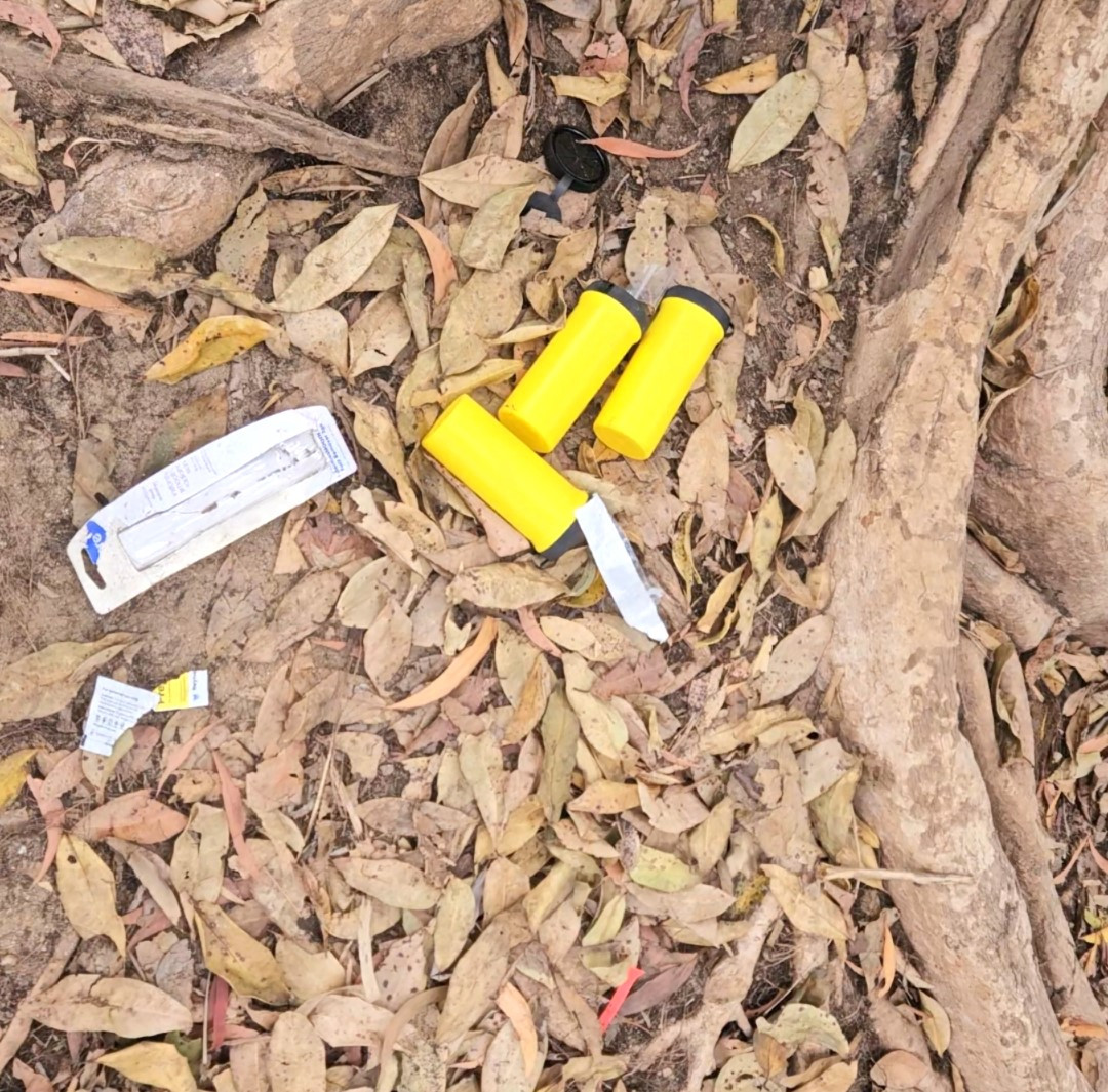 Remains of syringes left on the banks of the Barron River at Mareeba.