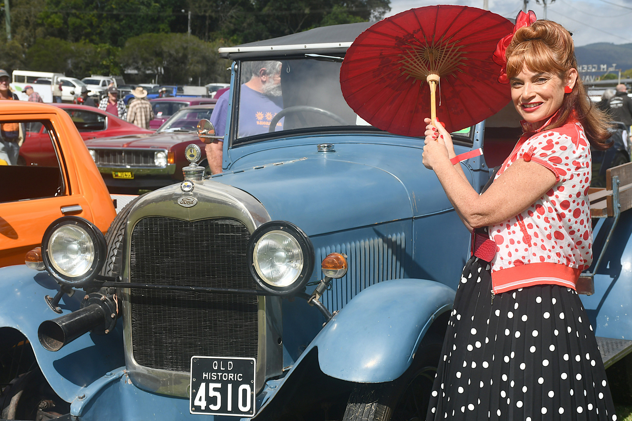 Megan Higgins was having a wonderful time looking at the cars on display.