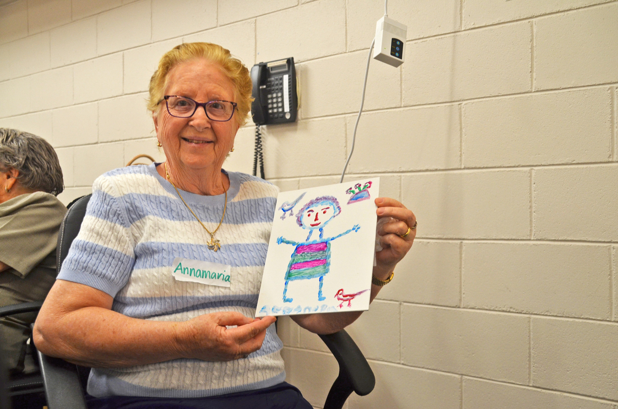 Annamaria drew a lovely photo with birds and flowers.
