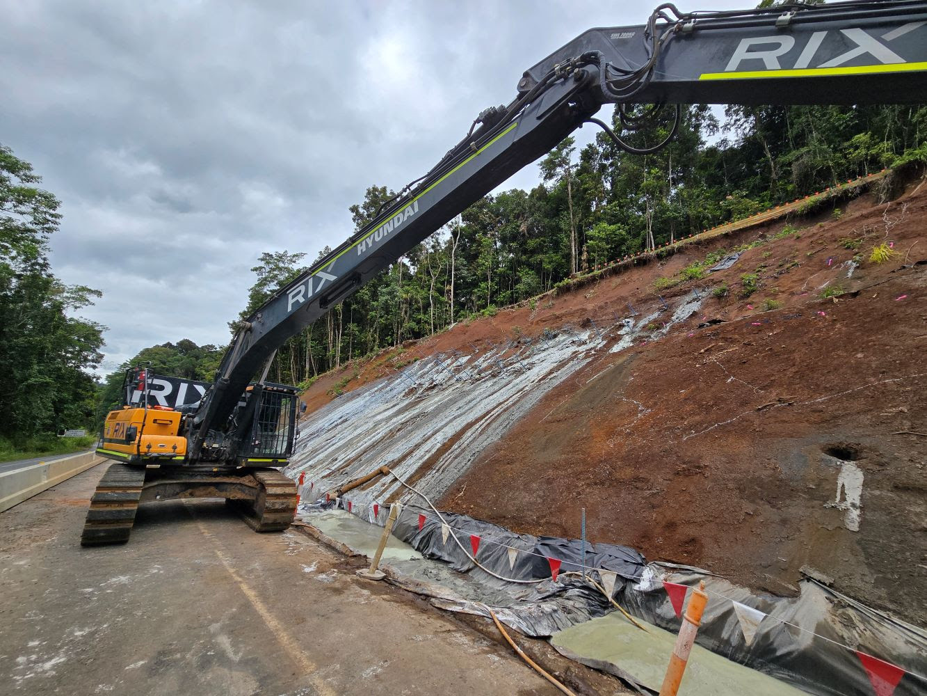 Ongoing batter trimming at Site 2, Palmerston Highway. Source: TMR