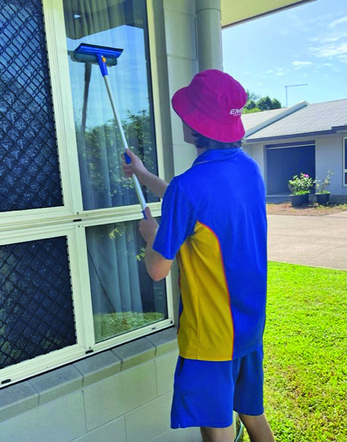 Cleaning windows with ECHO Malanda is one of the activities that Grade 12 students are participating in to give back to the Malanda Community.
