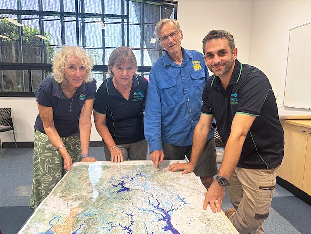 (from left) Margot Warnett from Barron Catchment Care, Shelley Templeman from TropWATER, Dermot Smyth from Yungaburra Landcare and Jack Koci from TropWATER brainstorm solutions for Peterson Creek.