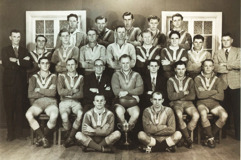 Phil (second row from front, second from right) was part of the Malanda rugby league team that won the premiership in 1950.