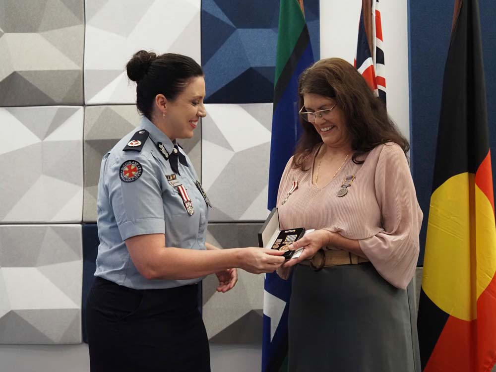 Connie Rovina receiving her 15-year National Medal.