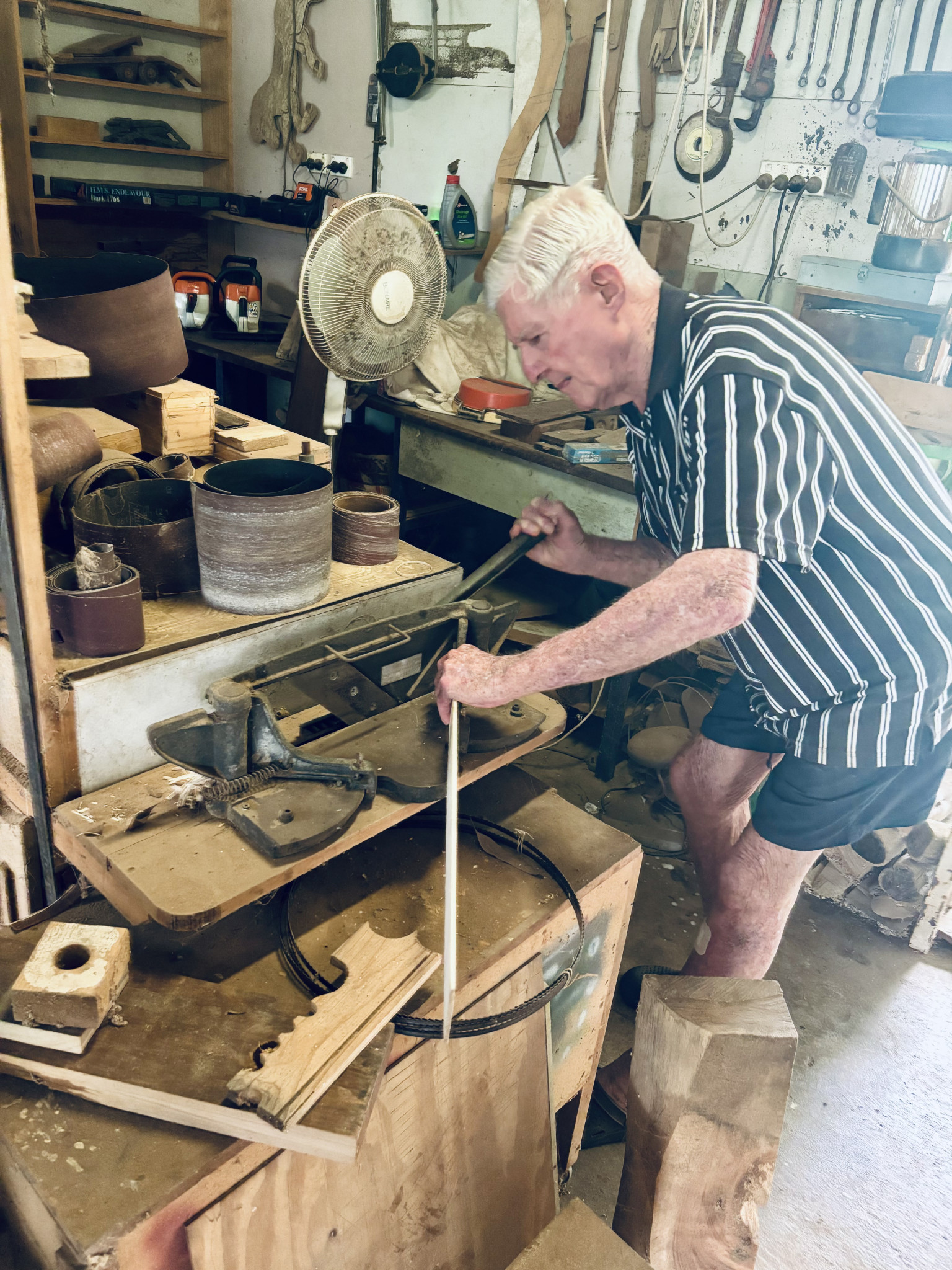 Jim at his band saw in his working shed.
