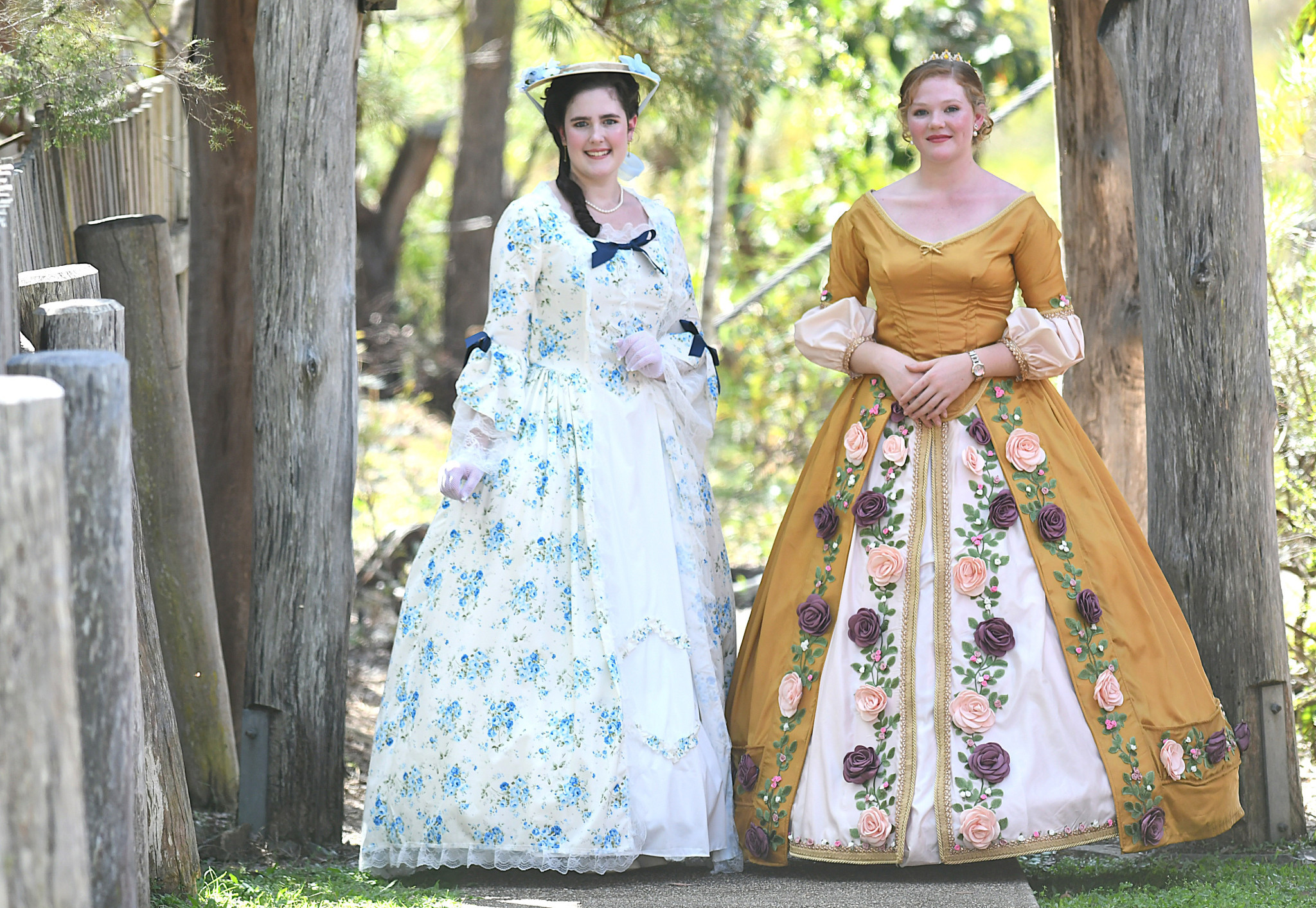 Sisters Alicia and Marcia Kuhn were as pretty as a picture in period dresses.