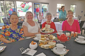 Prapree Mazlin (left), Mirella Brown, Sandra Freeman and Denise Peterson at the high tea on Saturday.