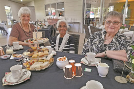 Margaret Dickenson (left) enjoyed the delights of the high tea with Philomena Joseph and Danuta Tanko.