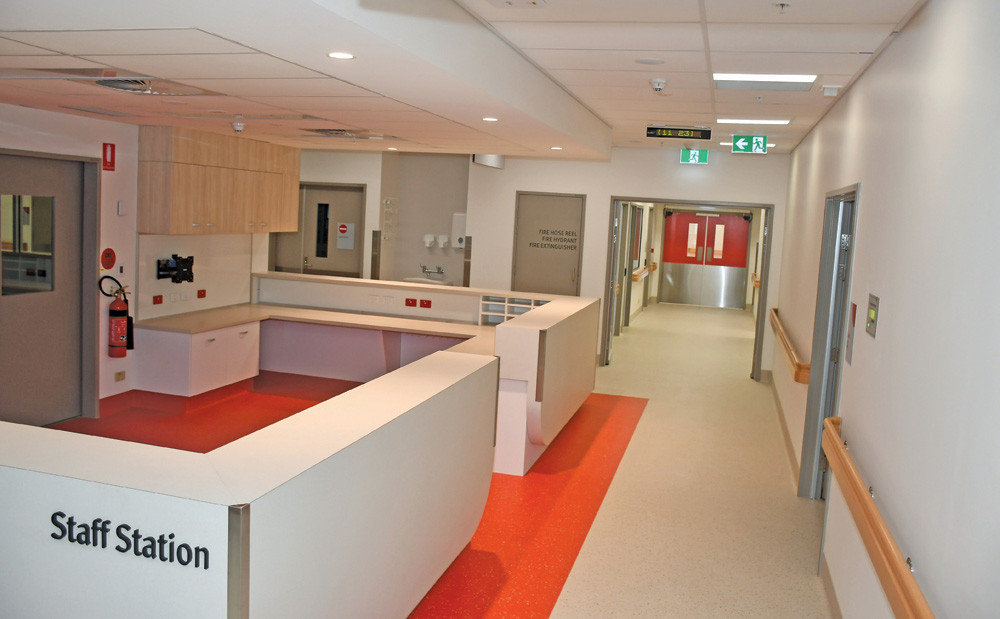 One of the roomy staff stations throughout the hospital, this one at the Cardiac Ward which has been colour-coded red.