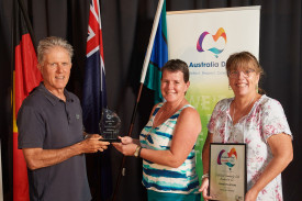 Members of Tablelands Community Link Association accept the Inclusion Award from Mayor Rod Marti.