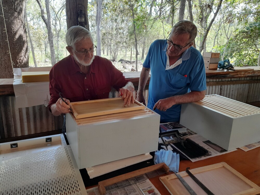 Brian Dick of Atherton builds a bee hive foundation frame under the watchful eye of instructor and honey producer, Graham Haigh.