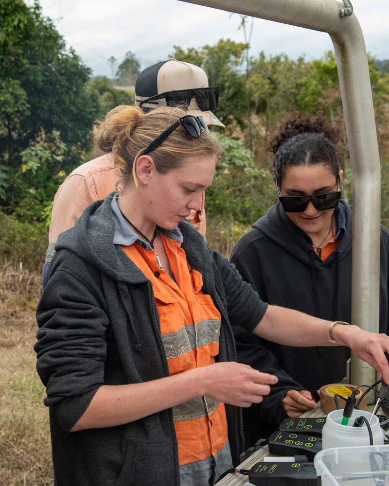 Heather Grant with NQLMS field staff testing stream water quality at the Gallo farm.