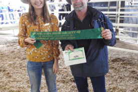 Rural Ambassador, Rikki Payne presents Alan Stokes with the award for Reserve Champion Female of the Show. (Picture Hide and Horns)