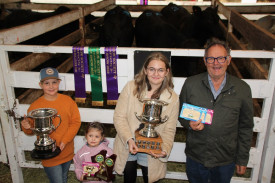 Mila, Alira Newton and Ella were excited to collect the trophies for Champion Bullock of the Show and Champion Pen of Three Butchers Bullocks, after Grandad, Gary Hanrahan nominated the cattle in their honour