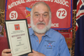Len Barbagallo with his Meritorious Award.