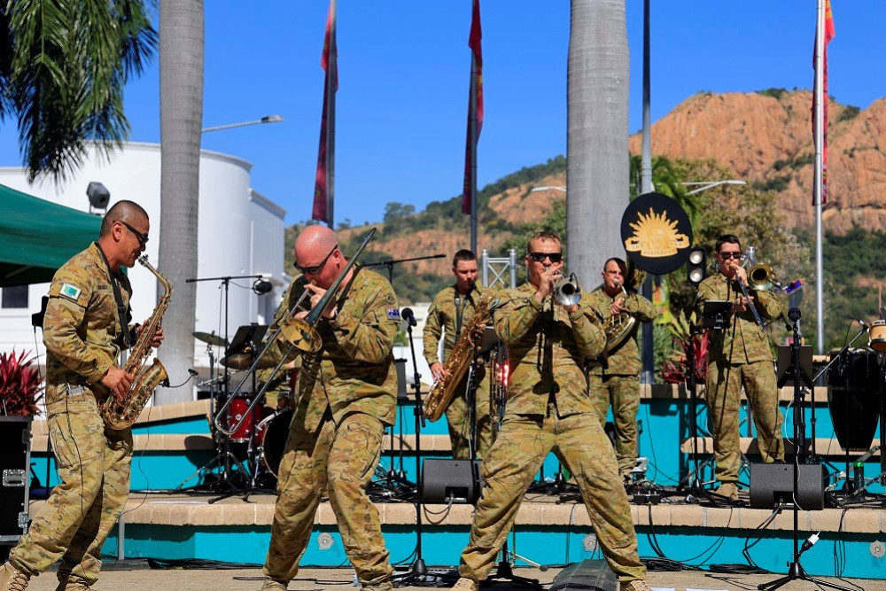 The 1 RAR Band members rocking it out during one of their performances.