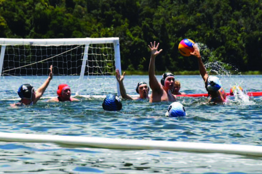 The Cairns Water Polo team playing at Lake Barrine in one of their last tournaments.
