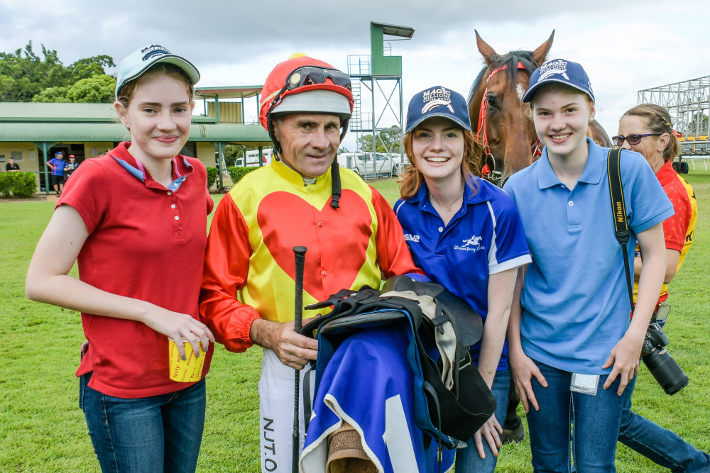 SUCCESS: Jockey Shane Pawsey rode three winners at the Mareeba Annuals on Saturday. Shane is pictured with his daughters Alicia, Jade and Brooke. PHOTO BY PETER ROY.