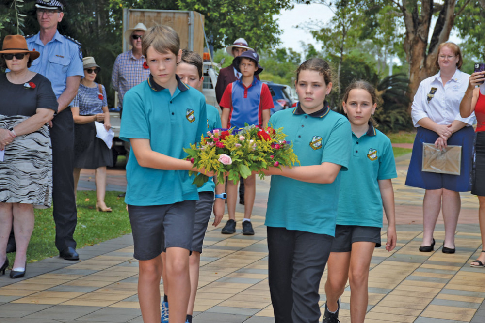 Mareeba State School leadership team laying a wreath at the Mareeba Cenotaph