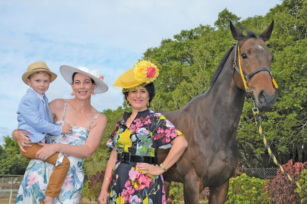 Prue Vaughan with her son William and Frances Petersen with Alex Maliff ’s race horse Paniagua who will be racing this year in the Mareeba Annuals.