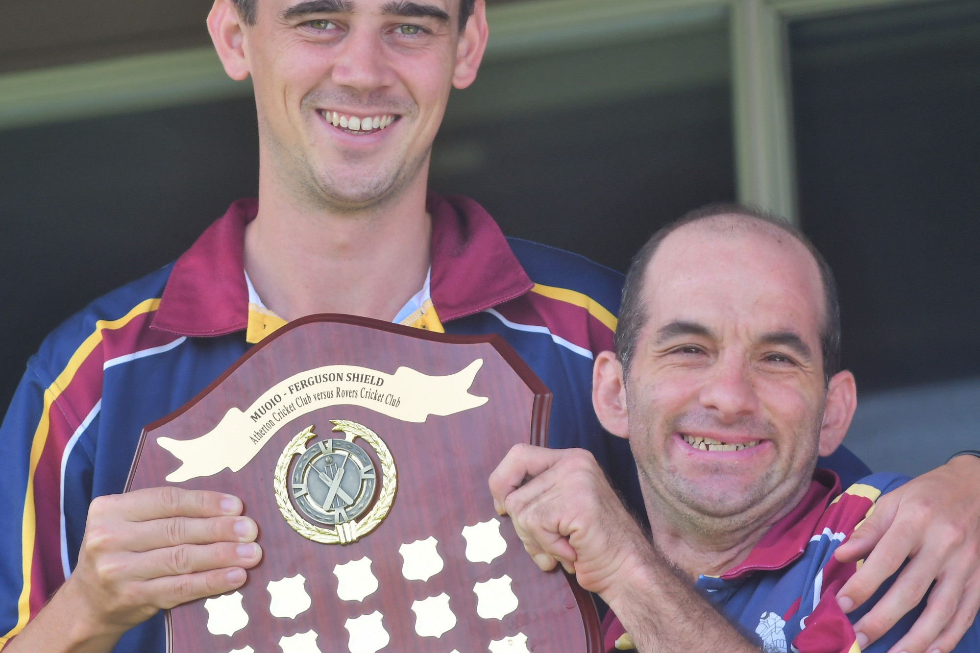 Anthony Muoio and Atherton Cricket A grade captain Tom Boorman with the Muoio-Ferguson Shield, named in honour of Anthony and Greg Ferguson.