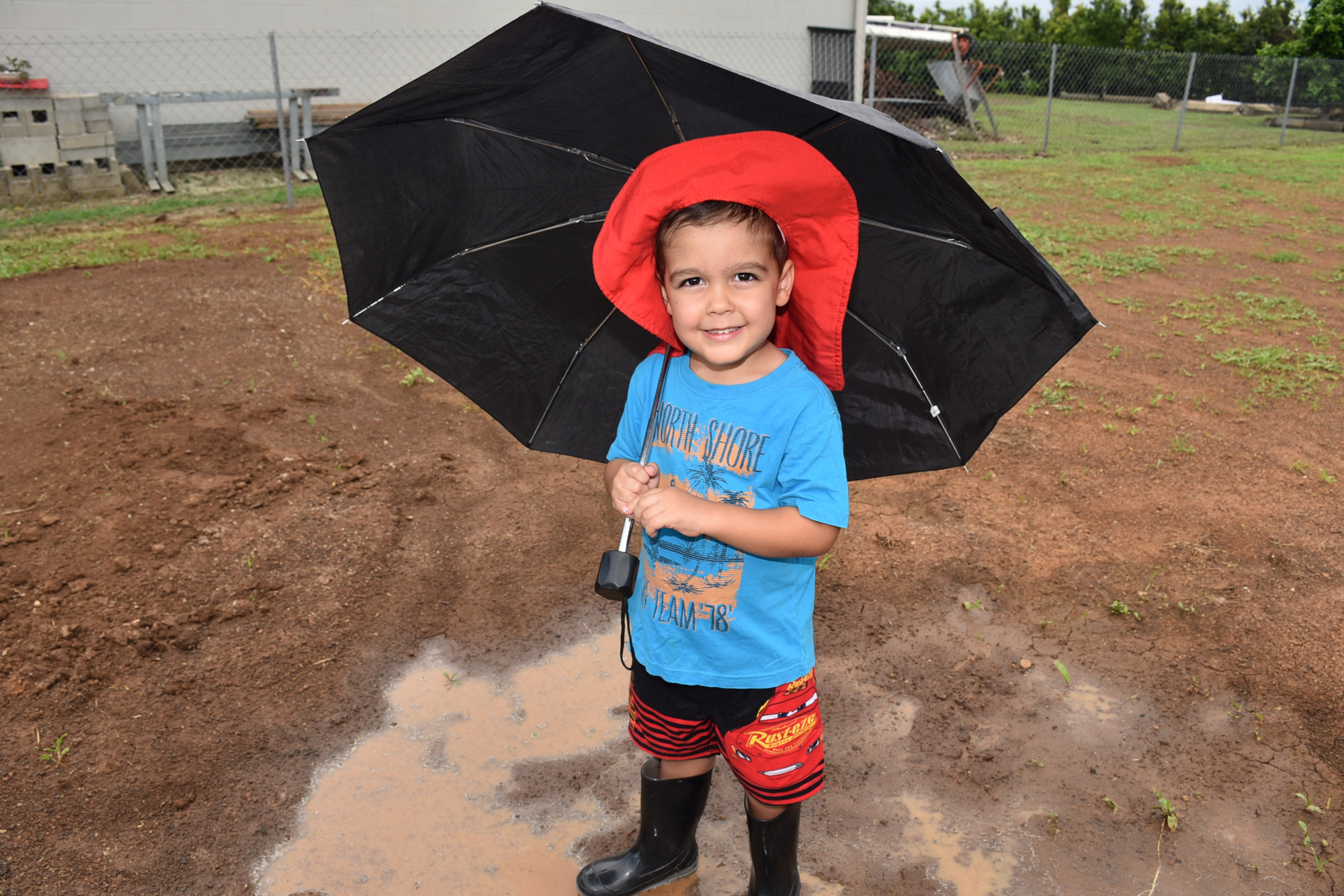 Three year-old Braxton Malfitana who got to jump in puddles thanks to wet the start of 2021.