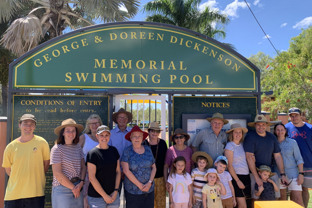 George and Doreen’s four children and their families outside the recently renamed George and Doreen Memorial Swimming Pool in Georgetown.