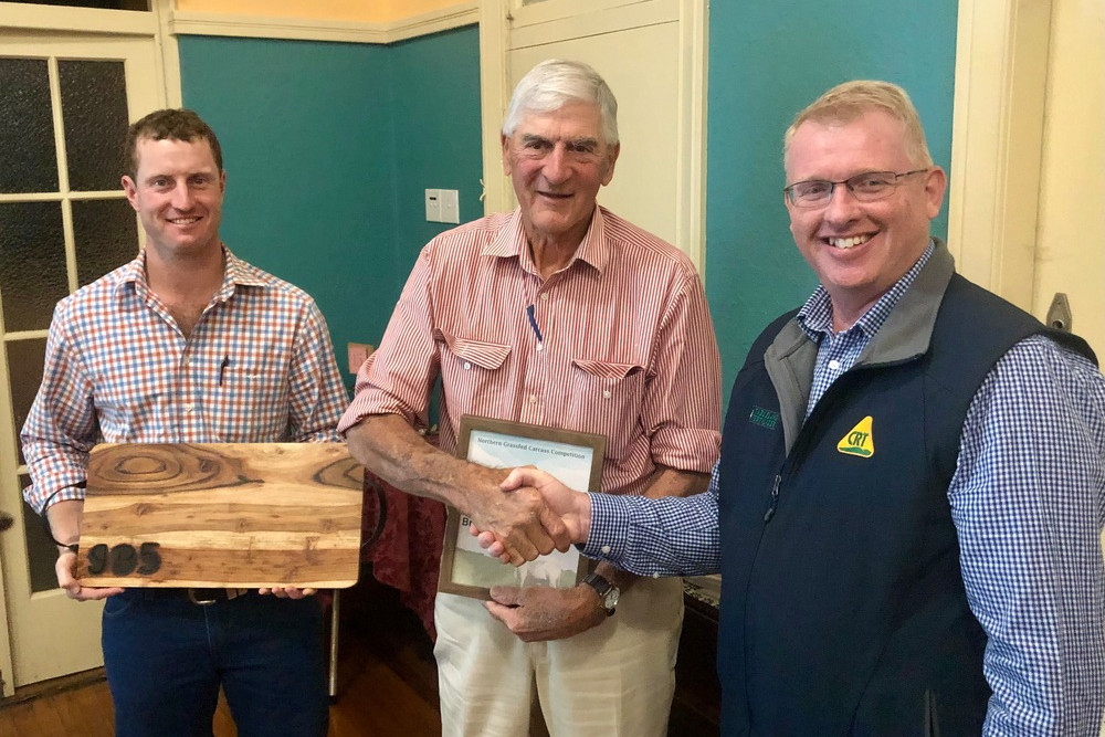 Competition winner, Greg Brown of Tolga (C), receives his prizes from Andrew Carcary, JBS (L) and a half ton of DAP from event sponsor, Paul Keevers (R) of Tableland Fertiliser, Atherton.