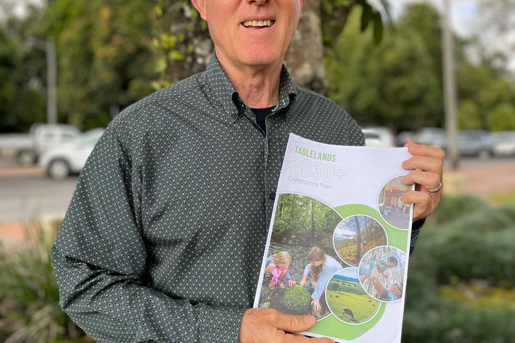 Tablelands Mayor Rod Marti with the community plan.