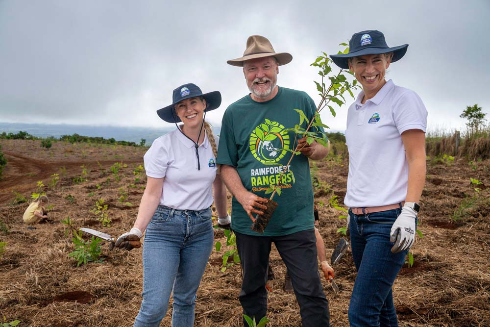 Helena O’Hare, Kelvin Davies (Rainforest Rangers), and Josine Breebaart took part in the first tree planting exercise.