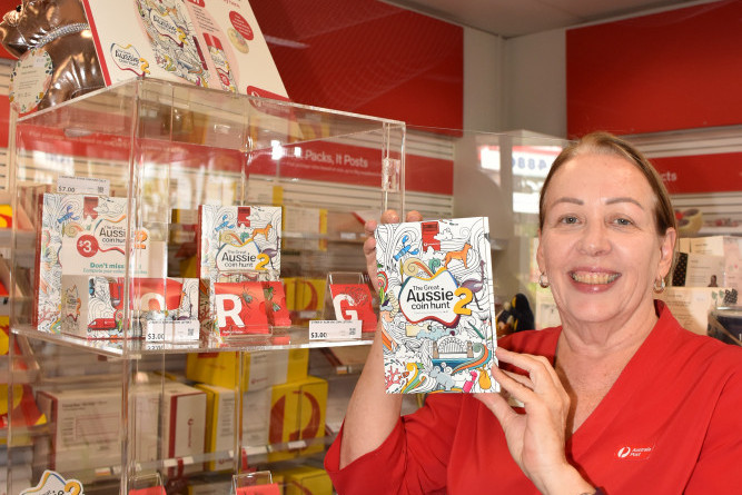 Postal Manager of the Mareeba Post Offi ce Eileen Cummins with some of the limited edition coins available in this year’s Great Aussie Coin Hunt.