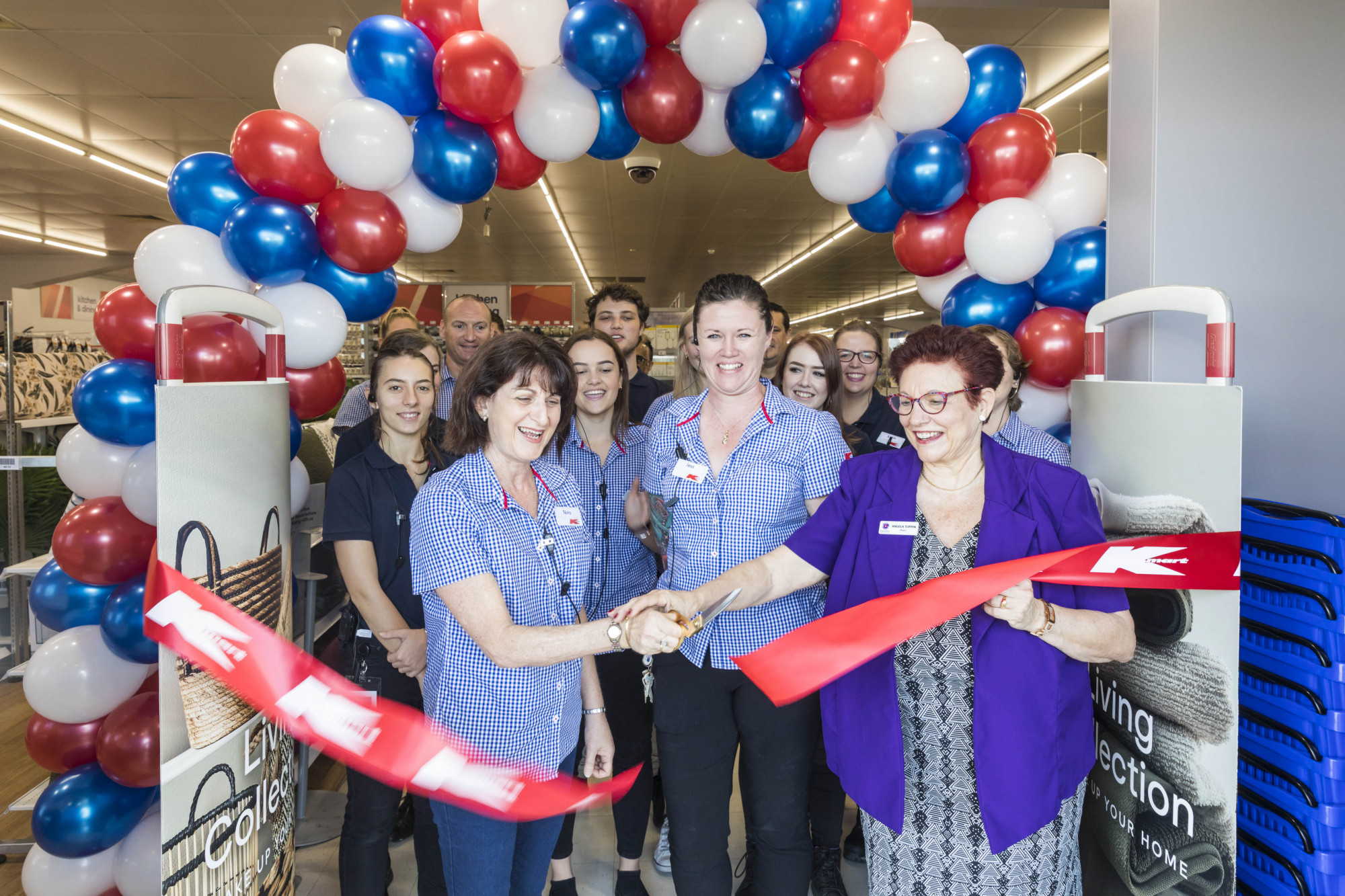 Store Managers Nina Avolio and Jess Gorton cutting the ribbon on the New K hub in Mareeba with MSC Mayor Angela Toppin.