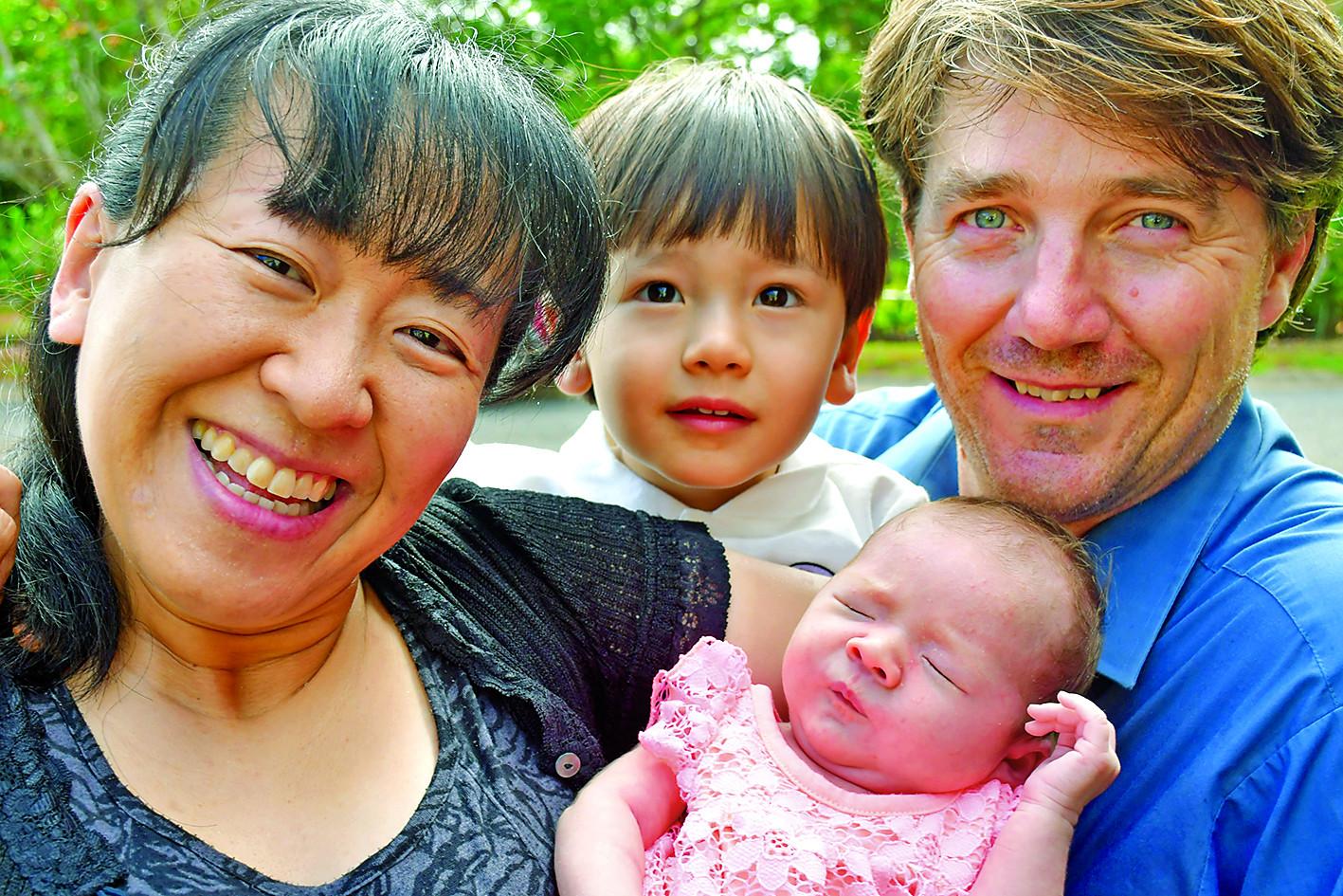 Baby Caroline pictured with parents Glenn and Hitomi Snelling and brother Ken